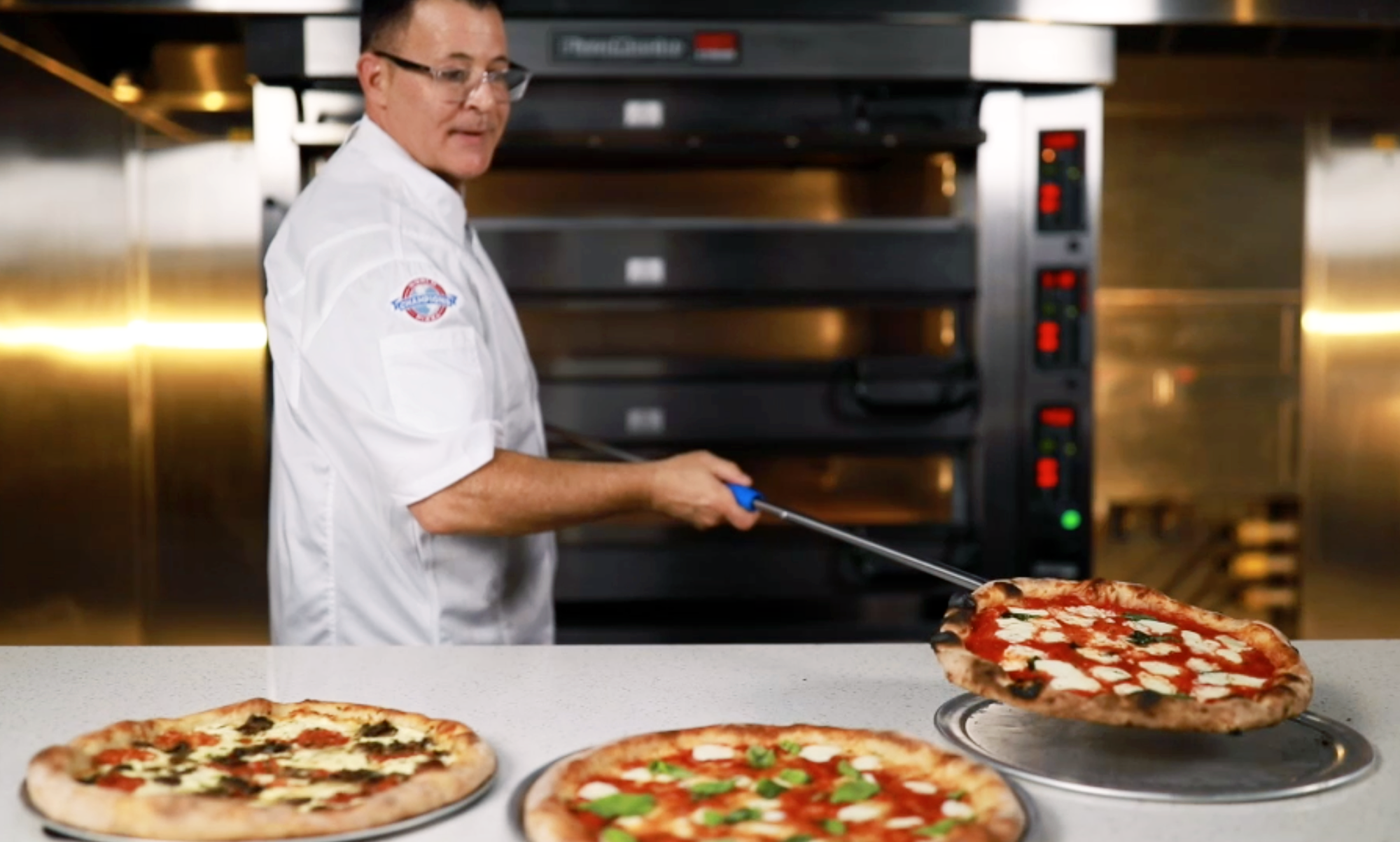 PM_lee_hunzinger_unloadingpizzas.png